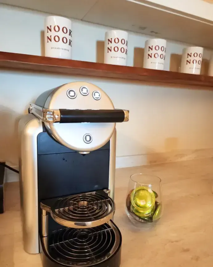 The Nespresso machine on the pantry counter